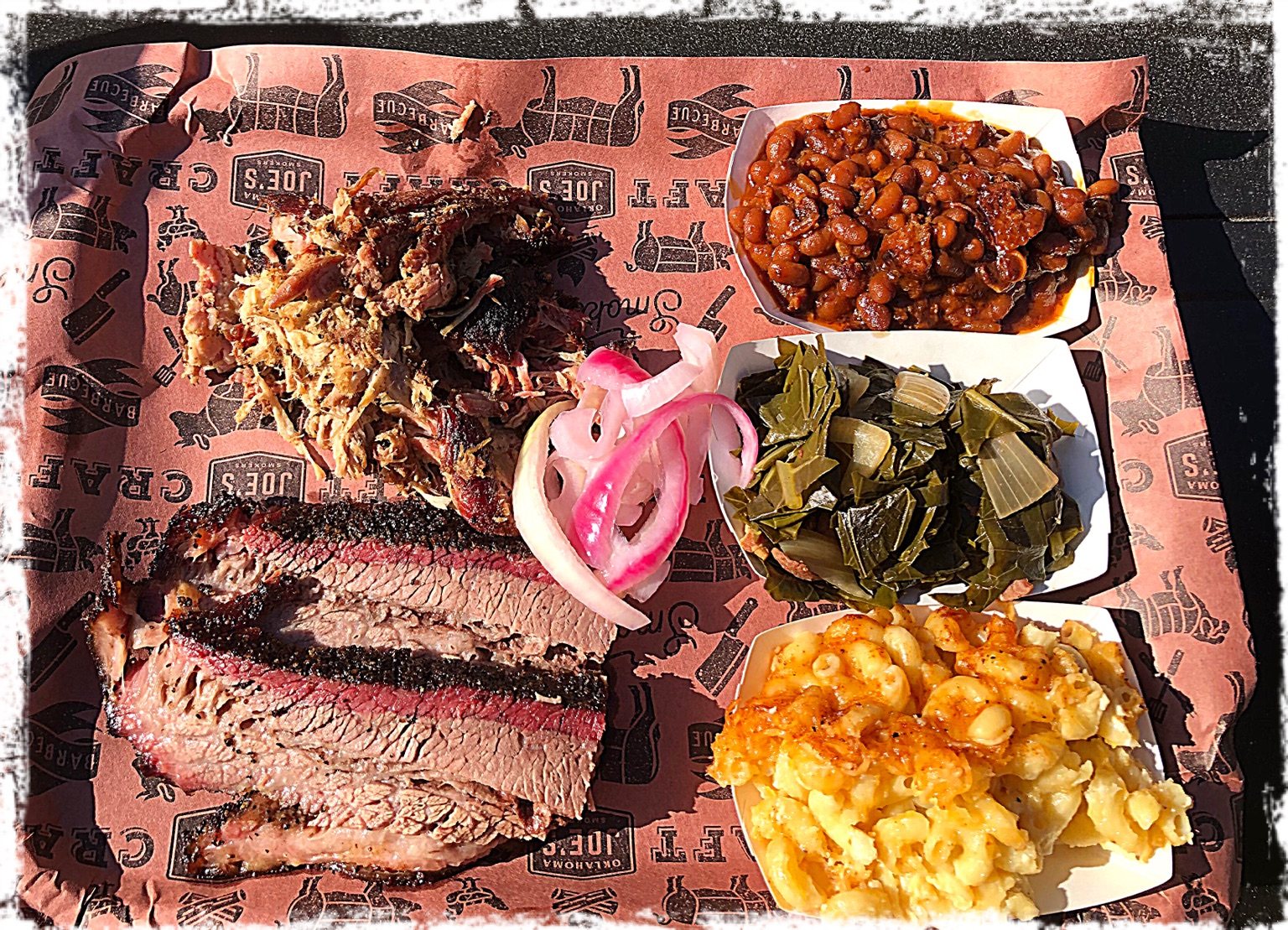 Sliced brisket, pulled pork and BBQ sides