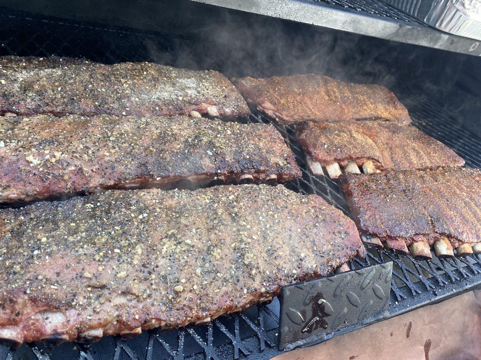 Ribs cooking inside the smoker